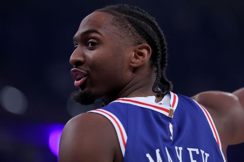 Philadelphia spoils the Knicks' banner night with a 106-100 win in the NBA opener